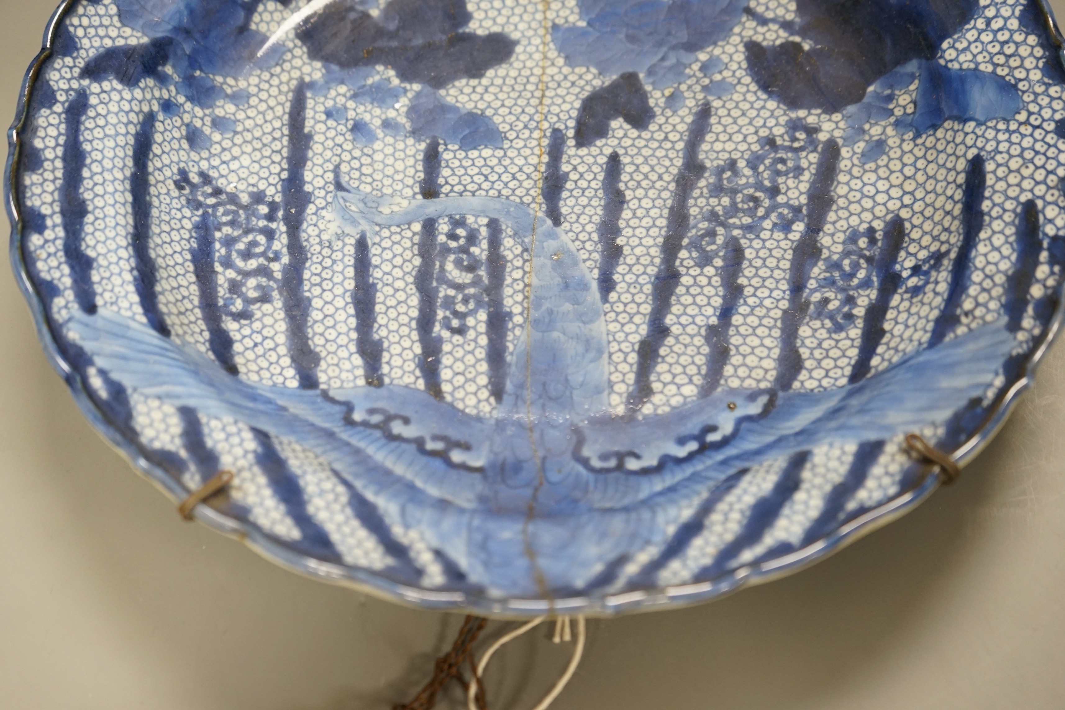 An 18th century Arita blue and white dish, 34cm